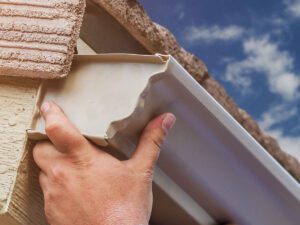 Section of seamless gutter, showcasing its lightweight yet sturdy construction."